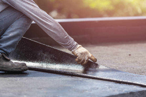 Professional Waterproofing technician working in Midland, PA